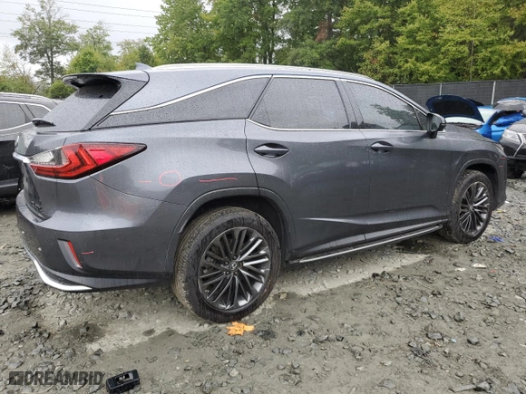 2022 Lexus RX with VIN JTJHGKFA4N2022294, listed as a Copart auction lot 71387154 with 61,232 mi miles and Salvage Title. Bid and sale history available at carsss.com. Image 3.