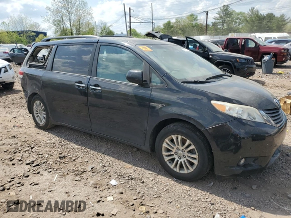 2011 Toyota Sienna XLE AAS with VIN 5TDYK3DC8BS019513, listed as a Copart auction lot 54671575 with 149,633 mi miles and Salvage Title. Bid and sale history available at DreamBid. Image 4.