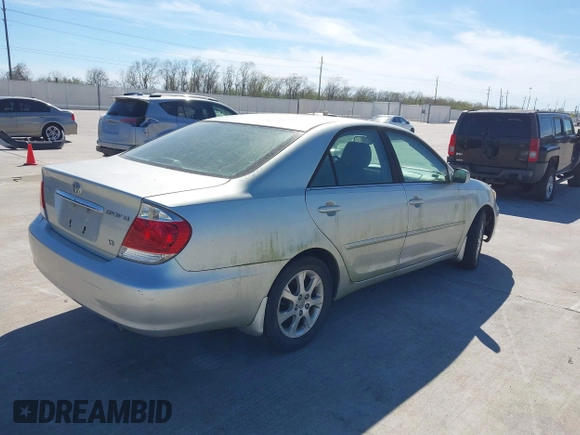 2005 Toyota Camry LE with VIN JTDBF32KX50162491, listed as a IAAI auction lot 41828892 with 98,541 mi miles and . Bid and sale history available at DreamBid. Image 4.