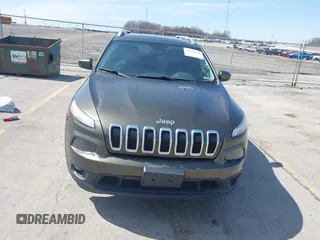 2015 Jeep Cherokee North with VIN 1C4PJMCS9FW588826, listed as a IAAI auction lot 41952883 with 145,586 mi miles. Bid and sale history available at carsss.com. Image 13.