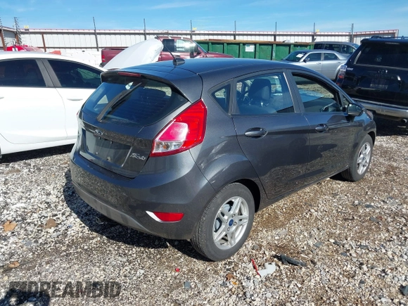 2019 Ford Fiesta SE with VIN 3FADP4EJ7KM138162, listed as a IAAI auction lot 40754211 with 51,886 mi miles. Bid and sale history available at carsss.com. Image 4.