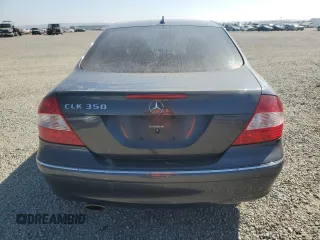 2009 Mercedes-Benz CLK 350 with VIN WDBTJ56H99F261060, listed as a Copart auction lot 69812004 with 105,218 mi miles and Salvage Title. Bid and sale history available at carsss.com. Image 6.