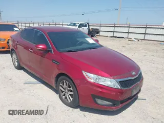 2013 Kia Optima LX with VIN 5XXGM4A7XDG247696, listed as a IAAI auction lot 42013026 with 119,209 mi miles. Bid and sale history available at carsss.com. Image 1.