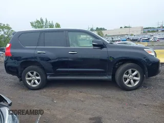 2011 Lexus GX 460 z VIN JTJBM7FX3B5032860, wystawiony jako IAAI lot #42371042 z przebiegiem 166 999 mil mil oraz . Historia ofert i sprzedaży dostępna na DreamBid. Obrazek 13.
