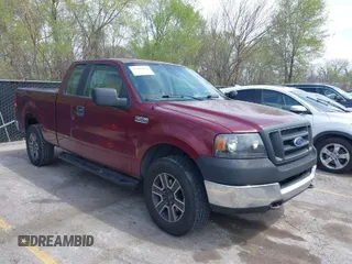 2005 Ford F-150 XLT with VIN 1FTPX14575KD79404, listed as a IAAI auction lot 42003073 with 212,050 mi miles. Bid and sale history available at carsss.com. Image 1.