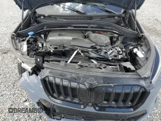 2023 BMW X1 xDrive28i z VIN WBX73EF00P5W09504, wystawiony jako Copart lot #51855325 z przebiegiem 37 759 mil mil oraz Szkoda całkowita • Salvage title. Historia ofert i sprzedaży dostępna na DreamBid. Obrazek 14.