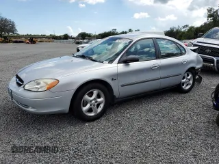 2000 Ford Taurus LX with VIN 1FAFP5225YA149260, listed as a Copart auction lot 62939945 with 62,273 mi miles and Salvage title. Bid and sale history available at DreamBid. Image 1.