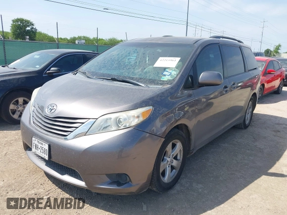 2012 Toyota Sienna LE AAS with VIN 5TDKK3DC8CS180967, listed as a IAAI auction lot 42215961 with 220,089 mi miles and . Bid and sale history available at DreamBid. Image 2.