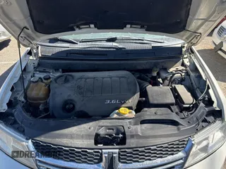 2012 Dodge Journey SXT with VIN 3C4PDDBG6CT249396, listed as a Copart auction lot 74334824 with 158,628 mi miles and Clean title. Bid and sale history available at DreamBid. Image 7.