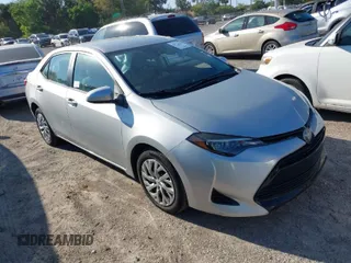 2019 Toyota Corolla L z VIN 5YFBURHE9KP894803, wystawiony jako IAAI lot #41771439 z przebiegiem 63 875 mil mil oraz . Historia ofert i sprzedaży dostępna na DreamBid. Obrazek 1.
