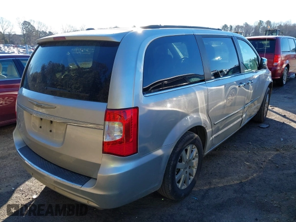 2011 Chrysler Town & Country Touring L with VIN 2A4RR8DGXBR714238, listed as a IAAI auction lot 41283027 with 205,498 mi miles and . Bid and sale history available at DreamBid. Image 4.