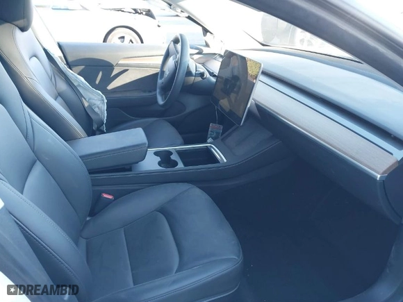 2023 Tesla Model 3 with VIN 5YJ3E1EA4PF421933, listed as a IAAI auction lot 41369120 with 21,914 mi miles. Bid and sale history available at carsss.com. Image 5.