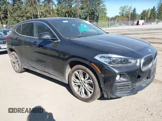 2018 BMW X2 xDrive28i with VIN WBXYJ5C30JEF69802, listed as a IAAI auction lot 42061382 with 55,138 mi miles. Bid and sale history available at carsss.com. Image 1.