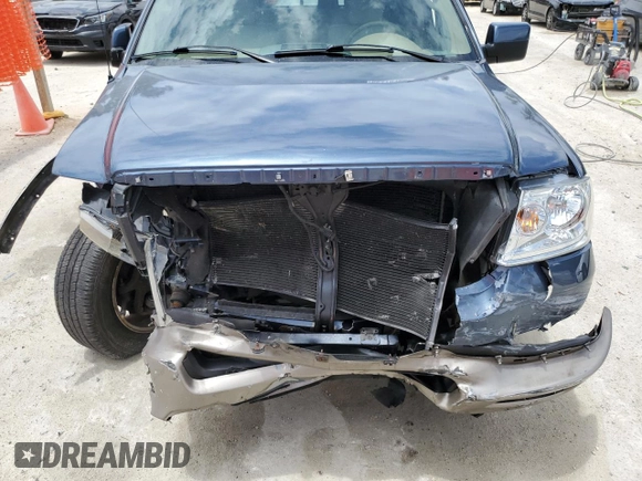 2004 Ford F-150 XLT z VIN 1FTPW12554KB71722, wystawiony jako Copart lot #58470185 z przebiegiem 200 095 mil mil oraz Szkoda całkowita • Salvage title. Historia ofert i sprzedaży dostępna na DreamBid. Obrazek 11.