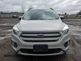 2018 Ford Escape SE with VIN 1FMCU9GD0JUA25579, listed as a Copart auction lot 51629605 with 121,678 mi miles and Clean Title. Bid and sale history available at carsss.com. Image 5.