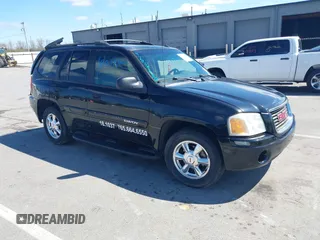 2004 GMC Envoy SLT with VIN 1GKDT13S542176987, listed as a IAAI auction lot 42039900 with 229,898 mi miles and . Bid and sale history available at DreamBid. Image 1.