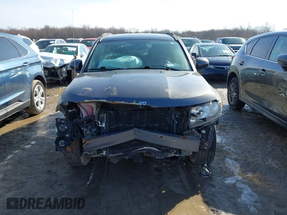 2017 Jeep Compass Latitude with VIN 1C4NJDEB0HD190200, listed as a IAAI auction lot 41733462 with 77,374 mi miles and . Bid and sale history available at DreamBid. Image 12.