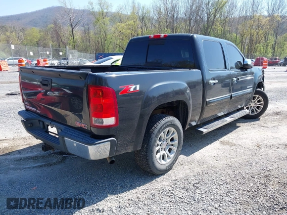 2010 GMC Sierra 1500 SLT with VIN 3GTRCWE09AG122055, listed as a IAAI auction lot 42064233 with 266,560 mi miles and . Bid and sale history available at DreamBid. Image 4.