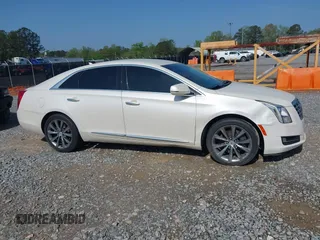 2014 Cadillac XTS with VIN 2G61L5S3XE9231858, listed as a IAAI auction lot 41941564 with 158,479 mi miles. Bid and sale history available at carsss.com. Image 13.
