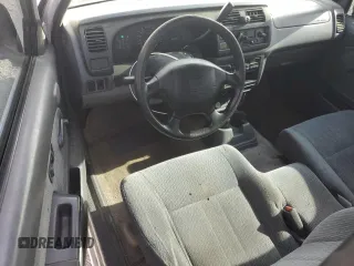 1999 Nissan Frontier XE with VIN 1N6DD26S4XC319806, listed as a Copart auction lot 54233635 with 311,759 mi miles and Clean title. Bid and sale history available at DreamBid. Image 8.