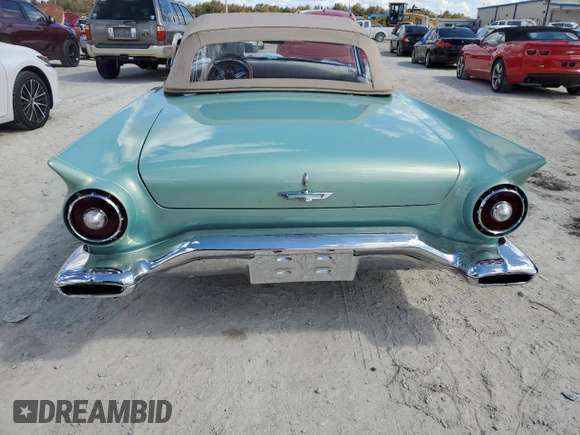1957 Ford Thunderbird with VIN D7FH182410, listed as a Copart auction lot 77671374 with 319 mi miles and Salvage Title. Bid and sale history available at DreamBid. Image 6.