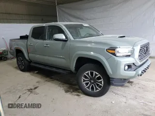 2023 Toyota Tacoma SR with VIN 3TMCZ5AN1PM536781, listed as a Copart auction lot 56674905 with 29,368 mi miles and Salvage title. Bid and sale history available at DreamBid. Image 4.