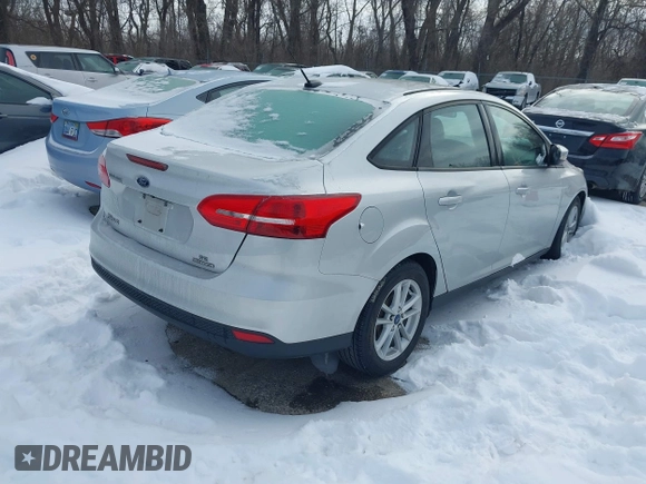 2015 Ford Focus SE z VIN 1FADP3F26FL357140, wystawiony jako IAAI lot #41256854 z przebiegiem 194 812 mil mil oraz . Historia ofert i sprzedaży dostępna na DreamBid. Obrazek 4.