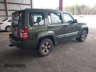 2008 Jeep Liberty Sport with VIN 1J8GN28K98W232003, listed as a IAAI auction lot 42127476 with 129,286 mi miles. Bid and sale history available at carsss.com. Image 4.