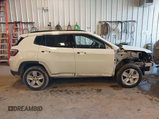 2022 Jeep Compass Latitude with VIN 3C4NJDBB9NT152152, listed as a IAAI auction lot 41377165 with 58,993 mi miles and . Bid and sale history available at DreamBid. Image 14.