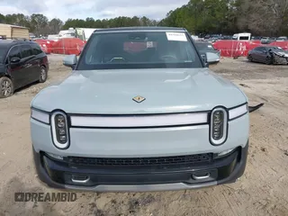 2024 Rivian R1S Adventure with VIN 7PDSGBBA1RN040036, listed as a IAAI auction lot 41694635 with 13,855 mi miles. Bid and sale history available at carsss.com. Image 13.