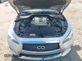 2015 Infiniti Q50 Premium z VIN JN1BV7AP1FM346254, wystawiony jako IAAI lot #42147947 z przebiegiem 147 737 mil mil oraz . Historia ofert i sprzedaży dostępna na DreamBid. Obrazek 10.