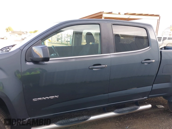 2015 GMC Canyon 2WD SLE with VIN 1GTG5BE35F1120622, listed as a IAAI auction lot 41421685 with 132,224 mi miles. Bid and sale history available at carsss.com. Image 14.