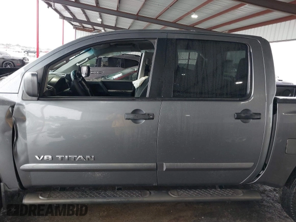 2014 Nissan Titan S with VIN 1N6AA0ECXEN504034, listed as a IAAI auction lot 39883492 with 189,529 mi miles and . Bid and sale history available at DreamBid. Image 13.