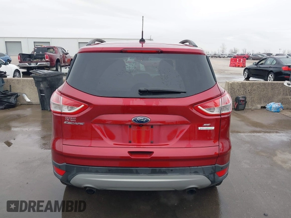 2015 Ford Escape SE with VIN 1FMCU0GXXFUC74470, listed as a IAAI auction lot 41419669 with 94,107 mi miles. Bid and sale history available at carsss.com. Image 16.
