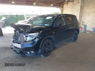 2021 Honda Passport Sport with VIN 5FNYF8H27MB021098, listed as a IAAI auction lot 41333241 with 101,239 mi miles and . Bid and sale history available at DreamBid. Image 17.