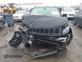 2018 Jeep Compass Latitude with VIN 3C4NJDBB0JT298644, listed as a IAAI auction lot 41581635 with 101,077 mi miles. Bid and sale history available at carsss.com. Image 12.