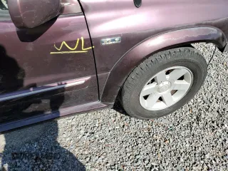 2003 Suzuki XL7 Touring z VIN JS3TY92V734100887, wystawiony jako Copart lot #80594514 z przebiegiem Nie podano mil oraz Szkoda całkowita • Salvage title. Historia ofert i sprzedaży dostępna na DreamBid. Obrazek 13.