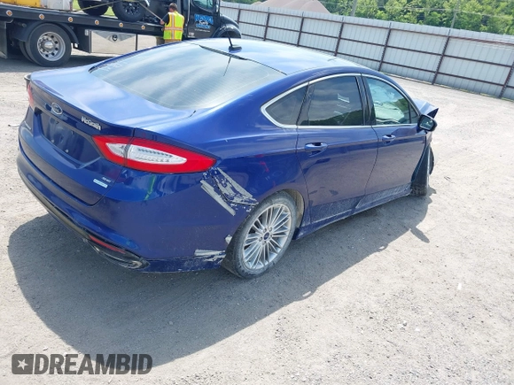 2015 Ford Fusion SE with VIN 3FA6P0H95FR227983, listed as a IAAI auction lot 42532582 with 169,940 mi miles and . Bid and sale history available at DreamBid. Image 4.