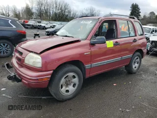 2000 Suzuki Vitara JX z VIN 2S3TD52V9Y6100173, wystawiony jako Copart lot #86200824 z przebiegiem Nie podano mil oraz Szkody całkowita. Historia ofert i sprzedaży dostępna na DreamBid. Obrazek 1.