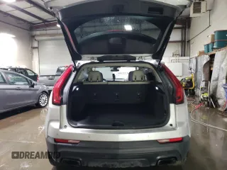2019 Cadillac XT4 AWD Luxury with VIN 1GYFZBR44KF128401, listed as a Copart auction lot 45926895 with 76,303 mi miles and Salvage Title. Bid and sale history available at carsss.com. Image 6.