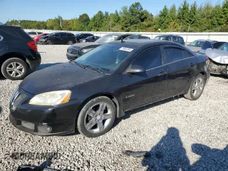 2009 Pontiac G6 GXP 1SA with VIN 1G2ZM577994101303, listed as a Copart auction lot 74840784 with 235,821 mi miles and Salvage title. Bid and sale history available at DreamBid. Image 1.