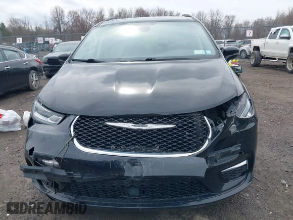 2022 Chrysler Pacifica Touring L with VIN 2C4RC1BG2NR117879, listed as a IAAI auction lot 41845778 with 96,523 mi miles and . Bid and sale history available at DreamBid. Image 12.