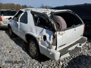 2000 GMC Jimmy SLS Base with VIN 1GKCS18W8YK276338, listed as a Copart auction lot 77056283 with 495,127 mi miles and Salvage Title. Bid and sale history available at carsss.com. Image 2.