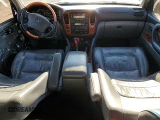 2000 Lexus LX 470 z VIN JT6HT00W1Y0084900, wystawiony jako Copart lot #41480235 z przebiegiem 213 577 mil mil oraz Szkoda całkowita • Salvage title. Historia ofert i sprzedaży dostępna na DreamBid. Obrazek 8.