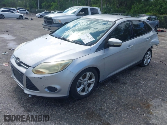 2013 Ford Focus SE with VIN 1FADP3F28DL217636, listed as a IAAI auction lot 42465123 with 187,088 mi miles and . Bid and sale history available at DreamBid. Image 2.