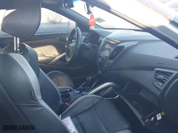 2016 Hyundai Veloster Turbo with VIN KMHTC6AE7GU264753, listed as a IAAI auction lot 41699222 with 999,999 mi miles. Bid and sale history available at carsss.com. Image 5.