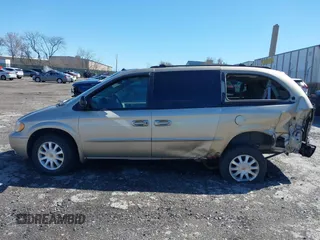 2002 Chrysler Town & Country EX with VIN 2C8GP74LX2R573857, listed as a IAAI auction lot 41846302 with Not Provided miles and . Bid and sale history available at carsss.com. Image 13.