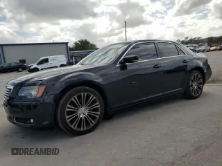 2014 Chrysler 300 S with VIN 2C3CCABT0EH189824, listed as a Copart auction lot 75988854 with 141,128 mi miles and Salvage Title. Bid and sale history available at DreamBid. Image 1.