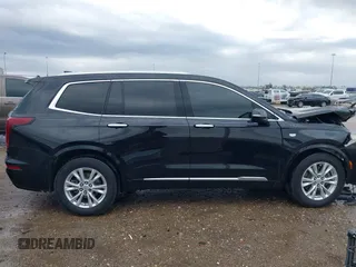 2023 Cadillac XT6 FWD Luxury with VIN 1GYKPAR44PZ114020, listed as a IAAI auction lot 41669115 with 110,305 mi miles. Bid and sale history available at carsss.com. Image 14.