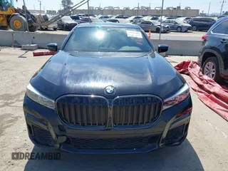 2022 BMW 7 Series 740i with VIN WBA7T2C07NCG88615, listed as a IAAI auction lot 39972481 with 76,169 mi miles. Bid and sale history available at carsss.com. Image 13.